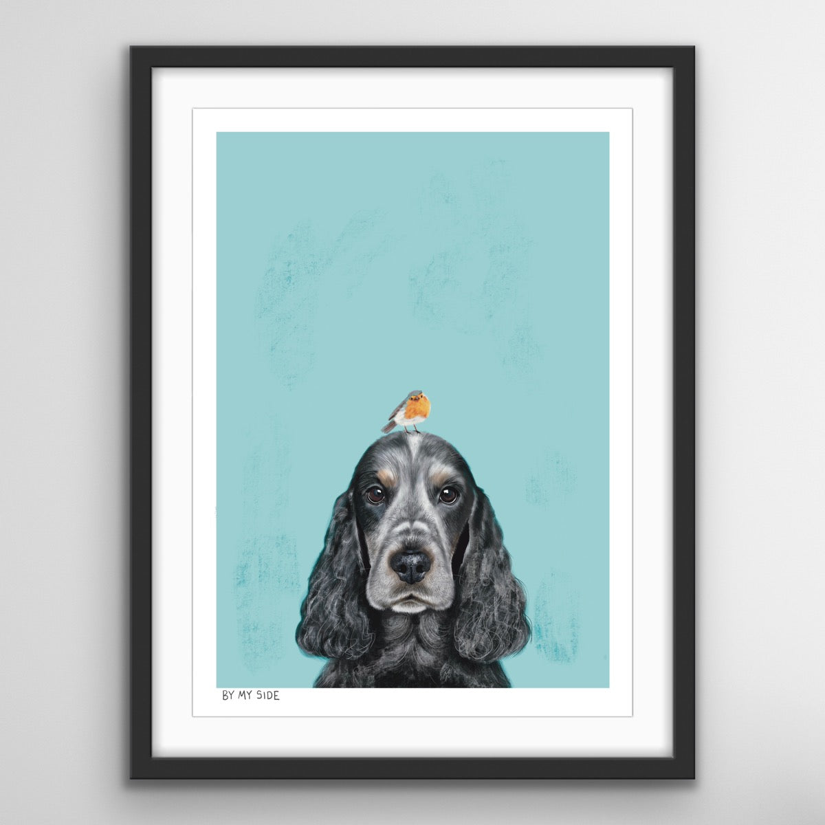 By My Side dog memorial print featuring a black cocker spaniel with a robin perched on its head, symbolising love, remembrance and connection after pet loss.