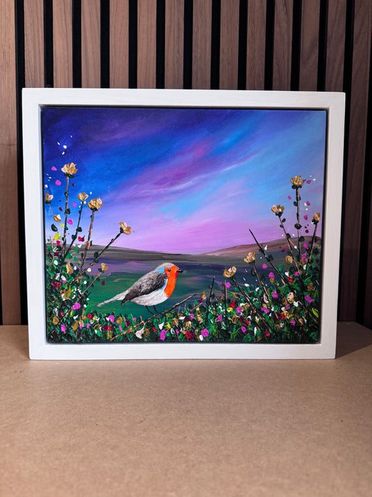 Original acrylic painting of a robin with 3D sculpted detail perched among textured wildflowers, set against a soft pastel sky, framed in a hand-painted wooden float frame.
