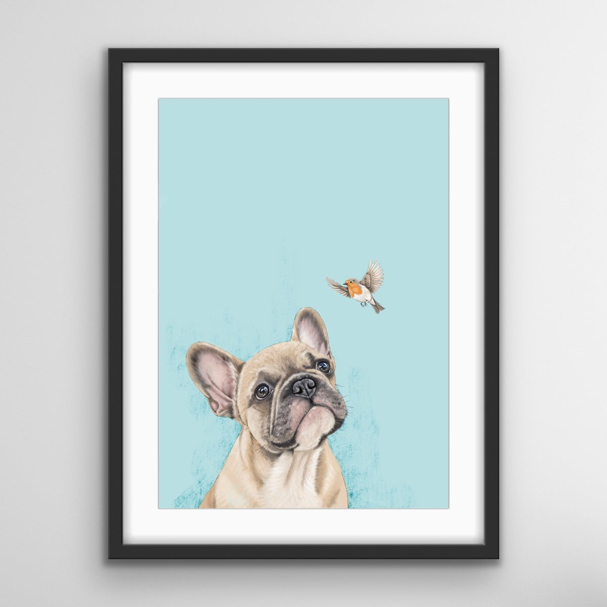 French Bulldog looking at a robin in flight against a soft blue background, symbolising love, companionship and cherished memories.