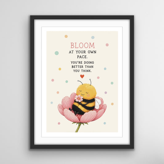 Bloom bee inspirational art print featuring a peaceful bee resting in a pink flower with the quote “Bloom at your own pace. You’re doing better than you think.”