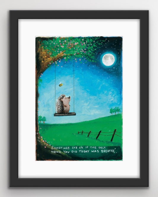 A hedgehog sitting on a swing under a moonlit sky with a calming quote about breathing and taking things one day at a time
