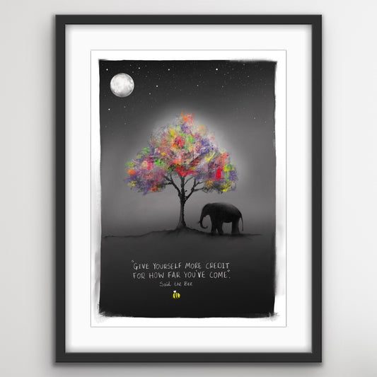 An elephant standing under a colourful tree at night with a motivational quote about giving yourself more credit and recognising personal growth